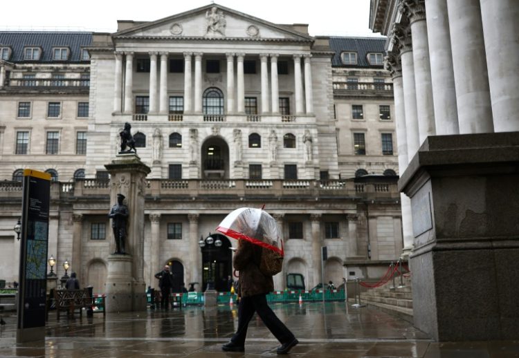 London's FTSE 100 hit a fresh record ahead of a Bank of England decision . ©AFP